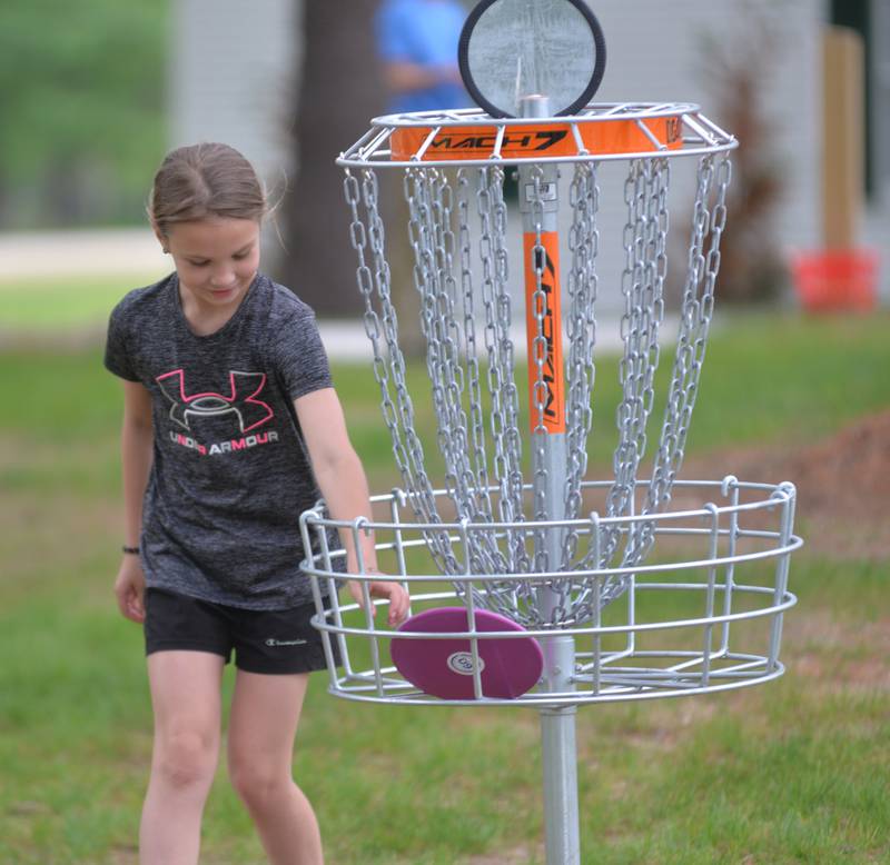 Wyatt Hendricks, 8, of Oregon, tried out the new disc golf course at the recently upgraded Oregon Park East Inland Side recreation area on Monday, May 18, 2026.