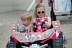 Kids show their rides and patriotic colors at Let Freedom Ring Kiddie Parade