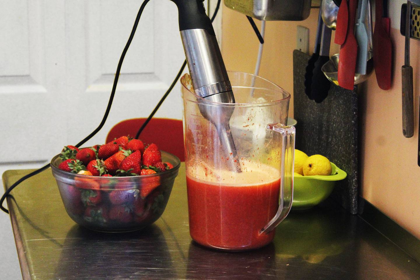 Fresh strawberries and lemons are used to make strawberry lemonade popsicles sold by Ms. Mint's Pop Shop of Franklin Grove.