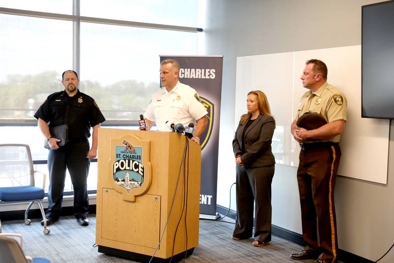 St. Charles Police Chief James Keegan (second from left), with (from left) Elgin Police Commander Steve Bianchi, Kane County State’s Attorney Jamie Mosser and Lt. Jim Draz of the Cook County Sheriff Department, announces the filing of charges for human trafficking-related offenses against multiple individuals during a press conference at the St. Charles Police Department on Thursday, June 20, 2023.