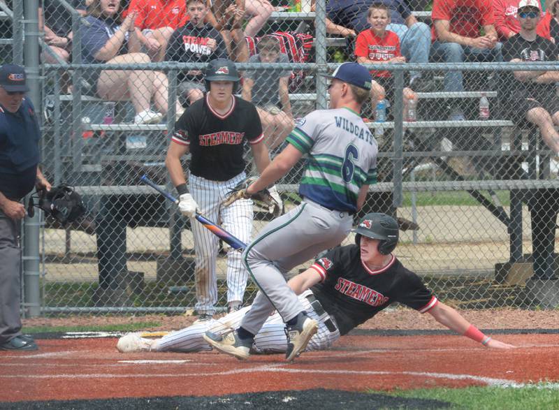 Fulton's Jacob Huisenga steals home on a pass ball against River Ridge/Scales Mound at the 1A Lena-Winslow Sectional final on Saturday, May 31, 2025.