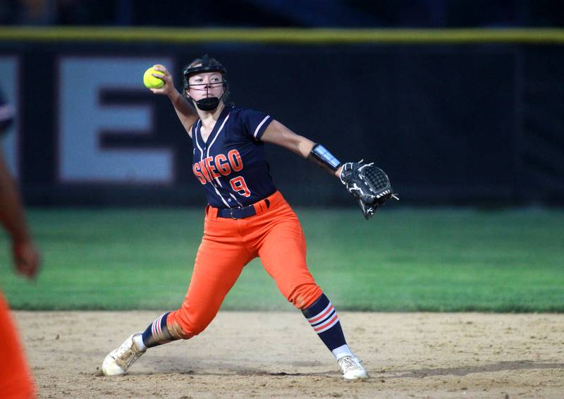 Oswego’s Kennedy Gengler throws to first during a Class 4A Benedictine Supersectional against Marist on Monday, June 9, 2025 in Lisle.