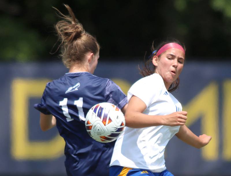 Johnsburg’s London Baidinger, right, battles Willows Academy’s Julia Lechner in IHSA Class 1A Supersectional soccer action at Dominican University in River Forest on Saturday, May 31, 2025.