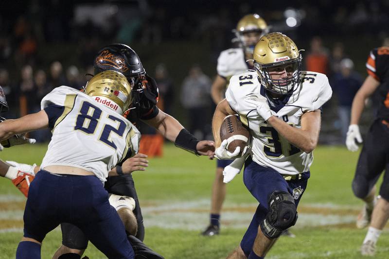 Polo's Noah Dewey picks up yards Friday, Oct. 4, 2024, against 8-man football rival Milledgeville.