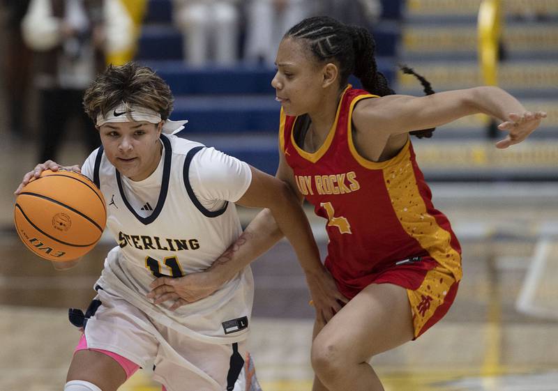Sterling’s Joslynn James works against Rock Island Tuesday, Nov. 25, 2025.