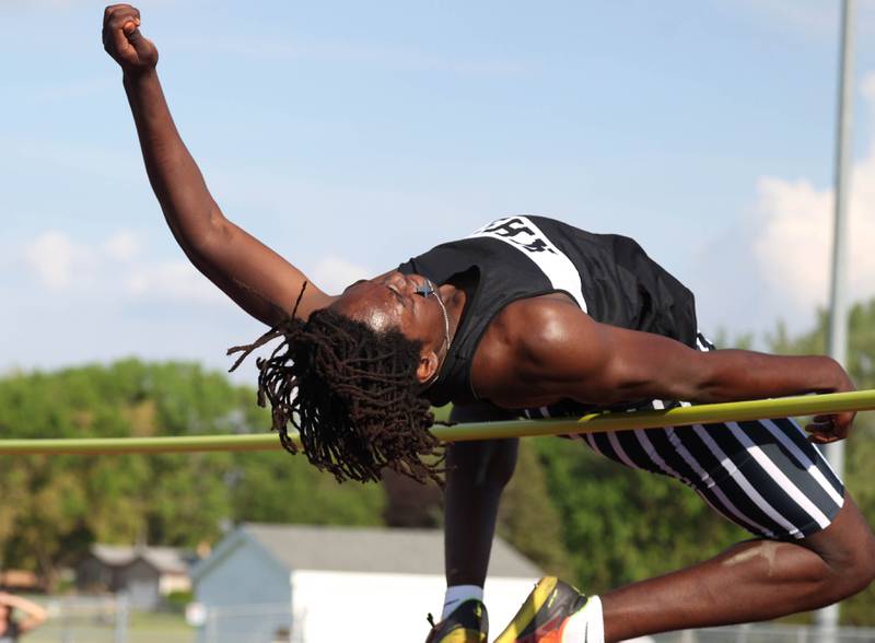 Kaneland’s Fredrick Hassan tries to clear the bar in the high jump Tuesday, May 13, 2025, during the Interstate 8 Conference boys track championships at Rochelle High School.