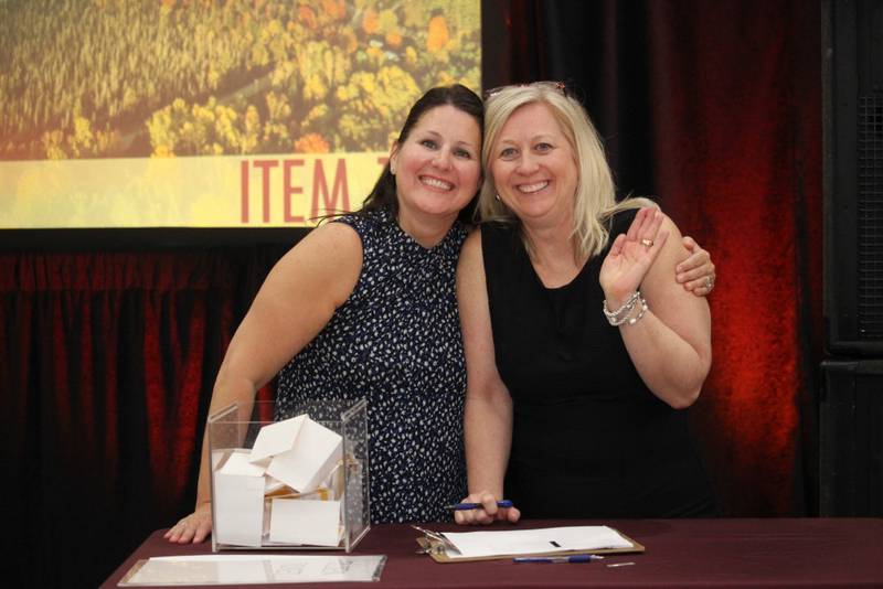 Montini Catholic Alumni Director Katie Hubeny, left and Maroon and Gold Gala event coordinator Michelle O'Connor.