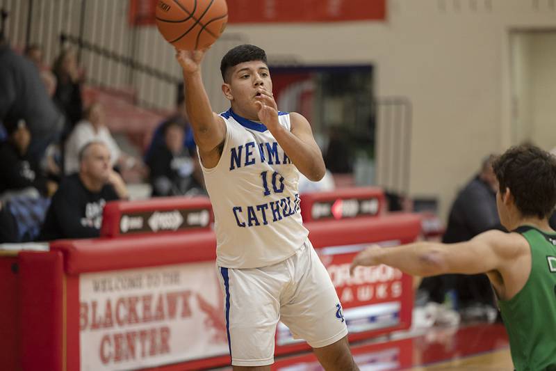 Newman's Gabe Padilla passes the ball Monday, Nov. 21, 2022 while playing North Boone in the Oregon Thanksgiving Tournament.