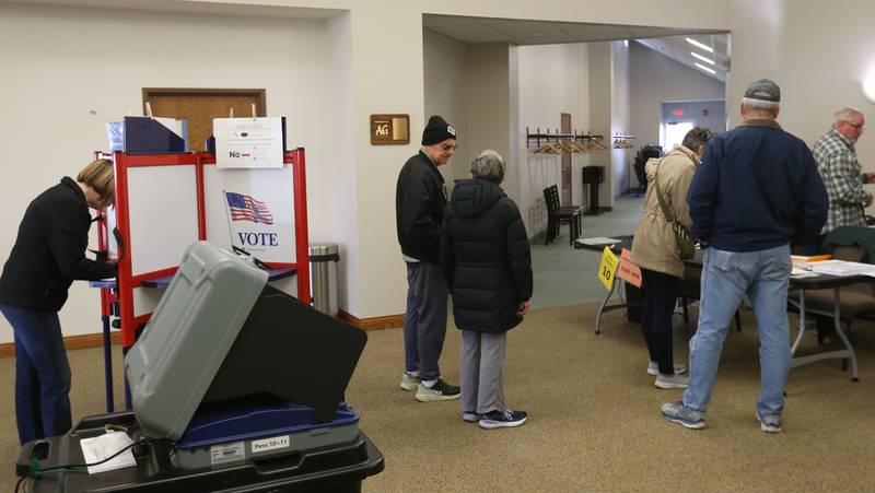 A line of voters wait to vote on Tuesday, April 1, 2025 at Faith Church in Peru.
