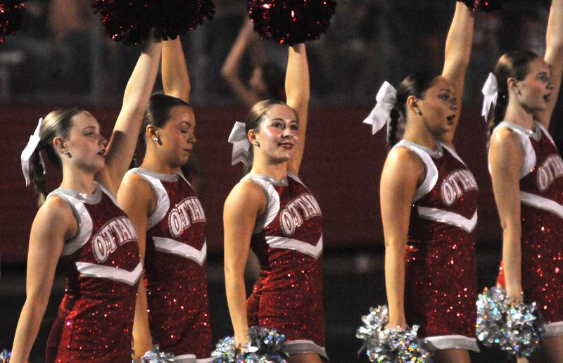 Ottawa pomerette Sierra Harmon (center) performs before the Ottawa homecoming game against Sycamore on Friday, Sept. 26, 2025 at King Field.