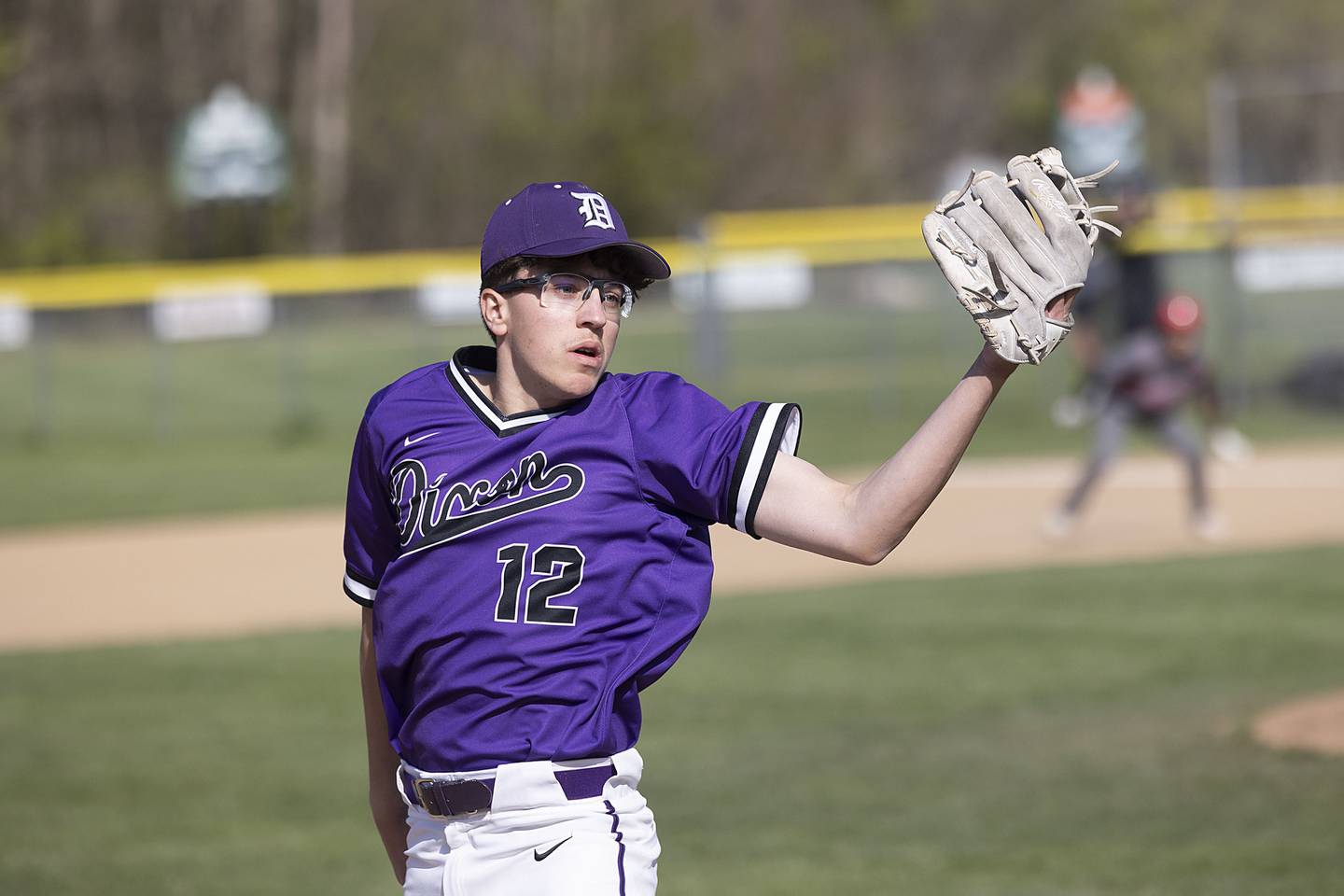 Dixon’s Ari Selmani reaches for an overthrown baseball against Stillman Valley Thursday, April 27, 2023.