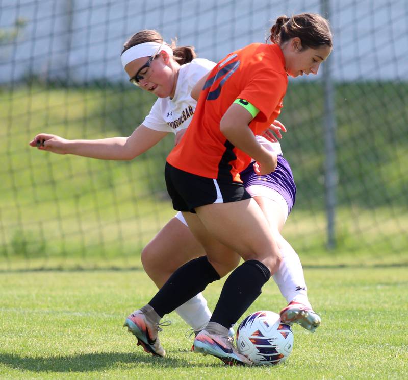 Crystal Lake Central’s Addison Schaffer, front, battles Hononegah’s Piper Aaker in IHSA Class 2A Sectional Semifinal girls soccer on Monday, May 25, 2026 at Crystal Lake Central High School in Crystal Lake.