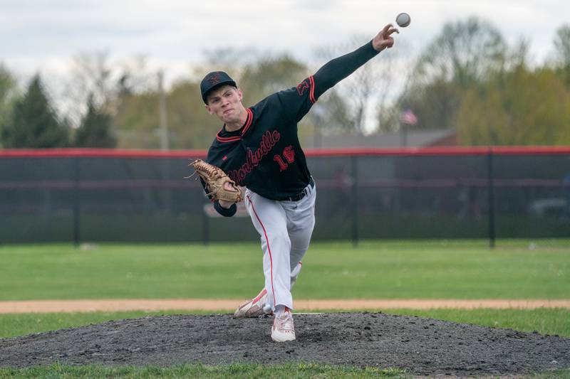Yorkville's Simon Skroch (16) delivers a pitch against Oswego East during a baseball game at Yorkville High School on Tuesday, May 2, 2023.