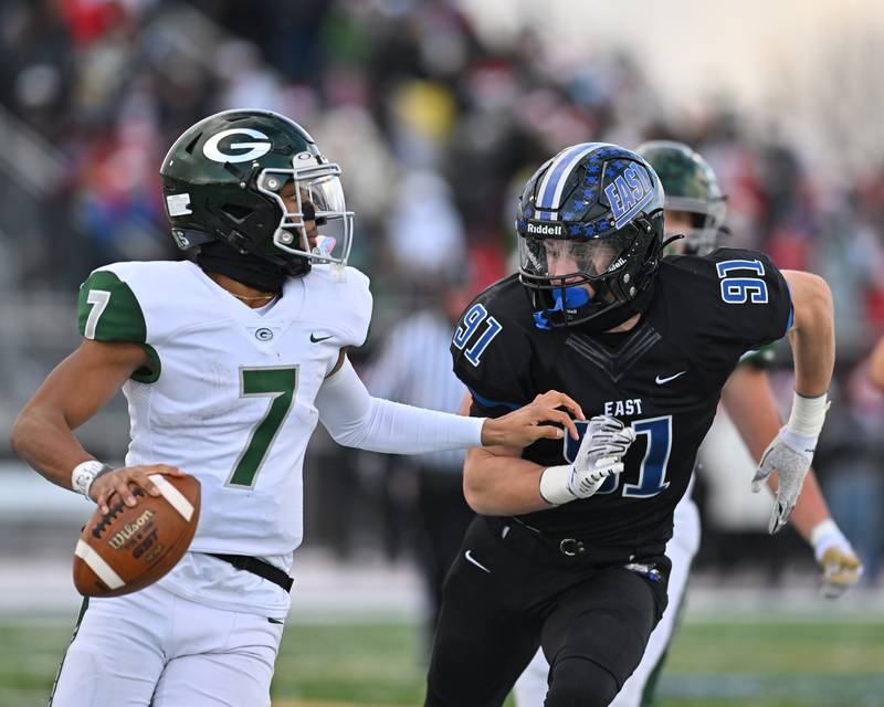 Lincoln-Way East's Caden O'rourke (91) in pursuit of Glenbard West's Korey Tai (7) during the IHSA Class 8A Semifinals on Saturday, November 19, 2022, at Frankfort.