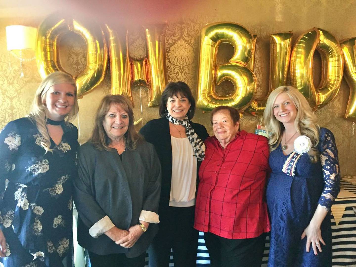 Carmel Perino (center) is pictured with some of her friends, including Sue Tomala of Homer Glen (in the gray blazer).