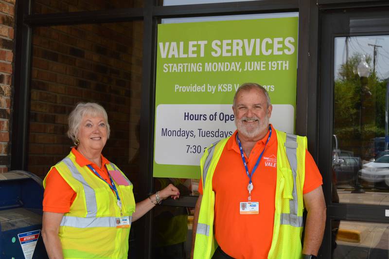 Jeanne and Jeff Kuhn, of Dixon, served as volunteer valets at KSB Commerce Towers on Monday. The service has been reinstated from 7:30 a.m. to noon on Mondays, Tuesdays and Thursdays, and is being staffed by volunteers.