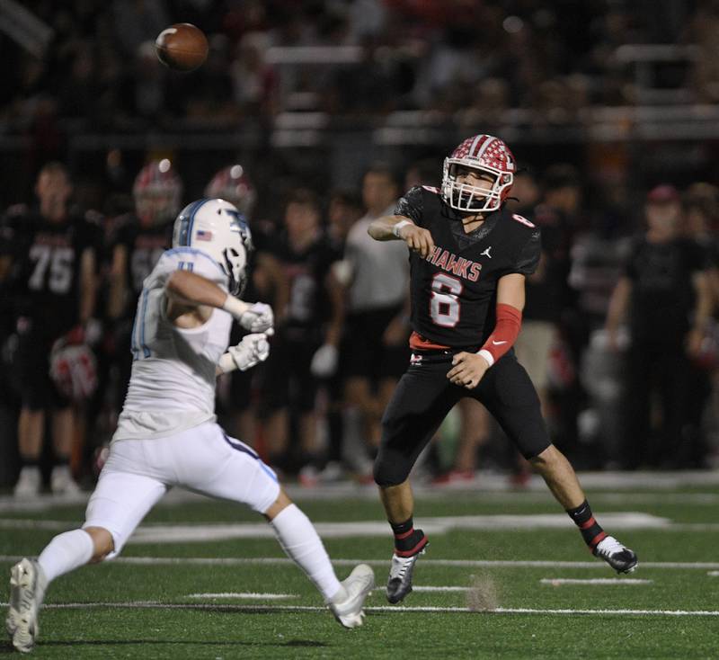 Maine South’s Jack Defilippis passes against Prospect in a Thursday night football game in Park Ridge on September 15, 2022.