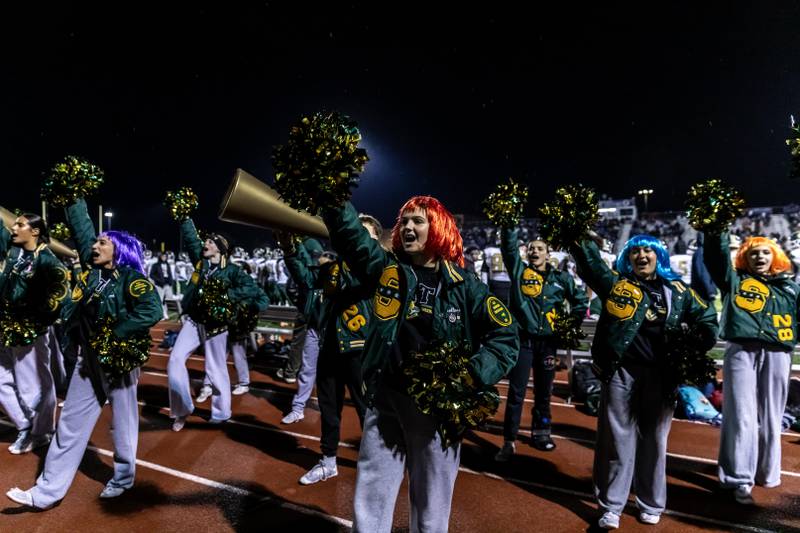 Stevenson’s varsity cheer team shares school spirit during a varsity football round one playoff game against Lincoln-Way East at Lincoln-Way East on Oct. 31, 2025.