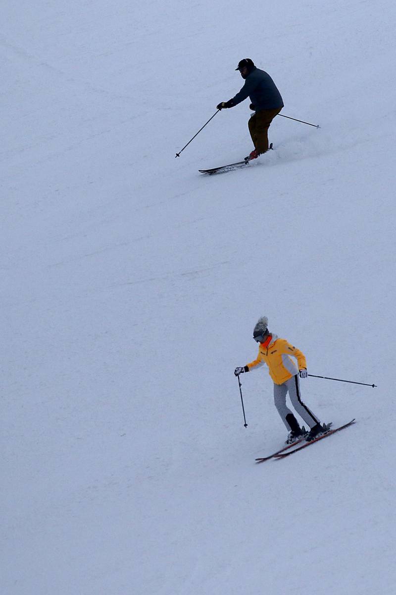 Skiers ski down Wilmot Mountain Ski Resort on Thursday, Jan. 16, 2025, in Wilmot, Wisconsin.