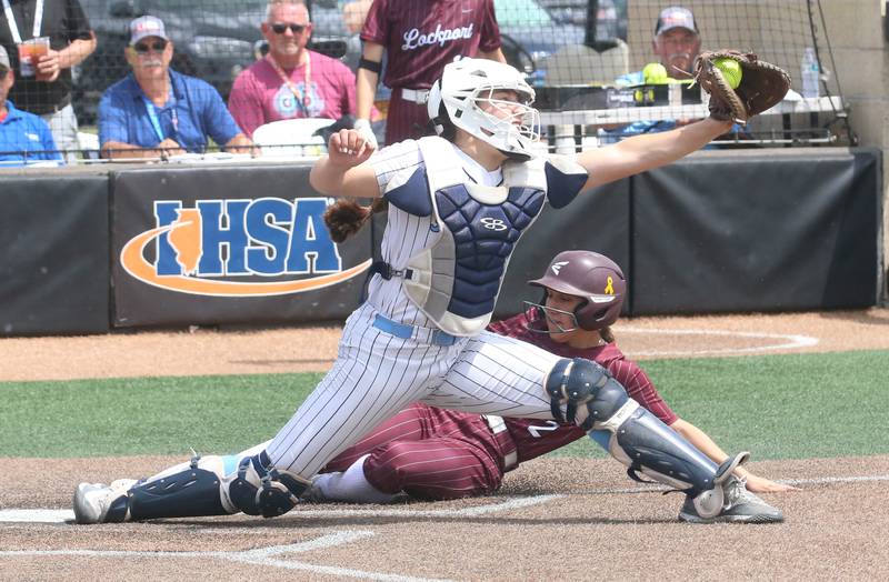 Lockport's Marie Baranowski is forced out at home by Oak Park River Forest catcher Liliana Janeczko during the Class 4A third place game on Saturday, June 14, 2025 at the Louisville Slugger Sports Complex in Peoria.