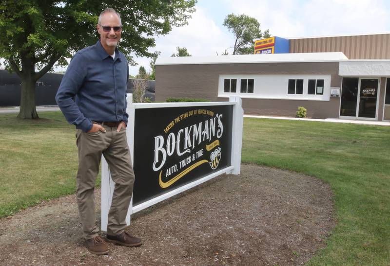 Jon Bockman, owner of Bockman’s Auto, Truck & Tire, Friday, Aug. 2, 2024, in front of his DeKalb location on Industrial Drive.
