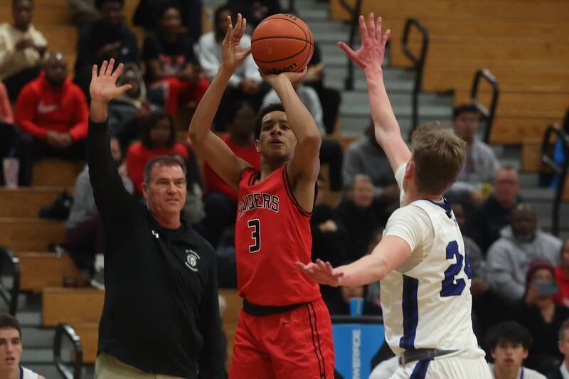 Bolingbrook’s Davion Thompson puts up the three-point shot against St. Francis in the Jack Tosh 2023 Holiday Classic on Wednesday, Dec.27th, 2023 in York.
