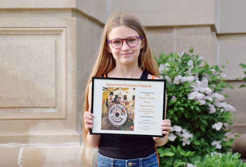 Harper Freiberg, a third grader at North Grove Elementary School, pictured, won the 2021 Sycamore Pumpkin Festival Theme Contest with her entry "Old-Fashioned Pumpkin Festival."