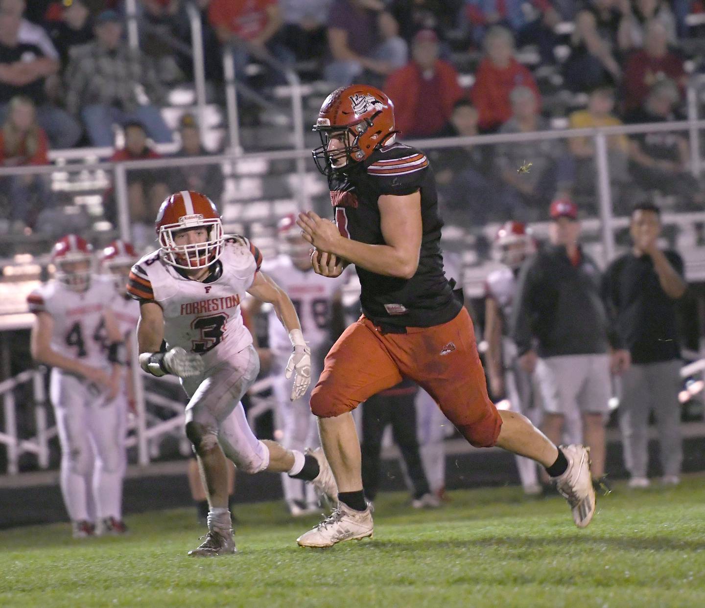 Fulton's Keegan VanKampen runs for yards.