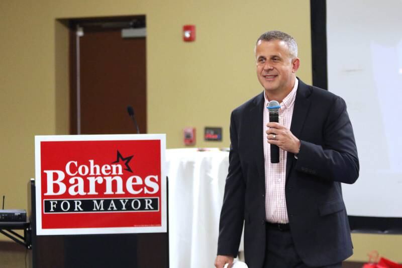 DeKalb mayoral candidate Cohen Barnes thanks his supporters as he declares victory in his race against Carolyn Morris Tuesday during an election night party at Faranda's Banquet Center in DeKalb.