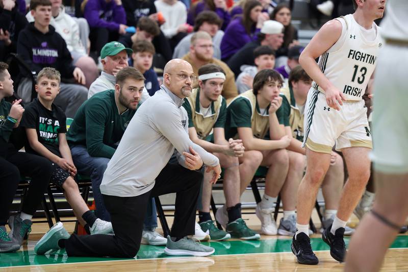 Bishop McNamara head coach Adrian Provost watches a free throw during the Fightin' Irish's 61-24 victory over Wilmington in the IHSA Class 2A Seneca Sectional semifinal on Tuesday, March 3, 2026.