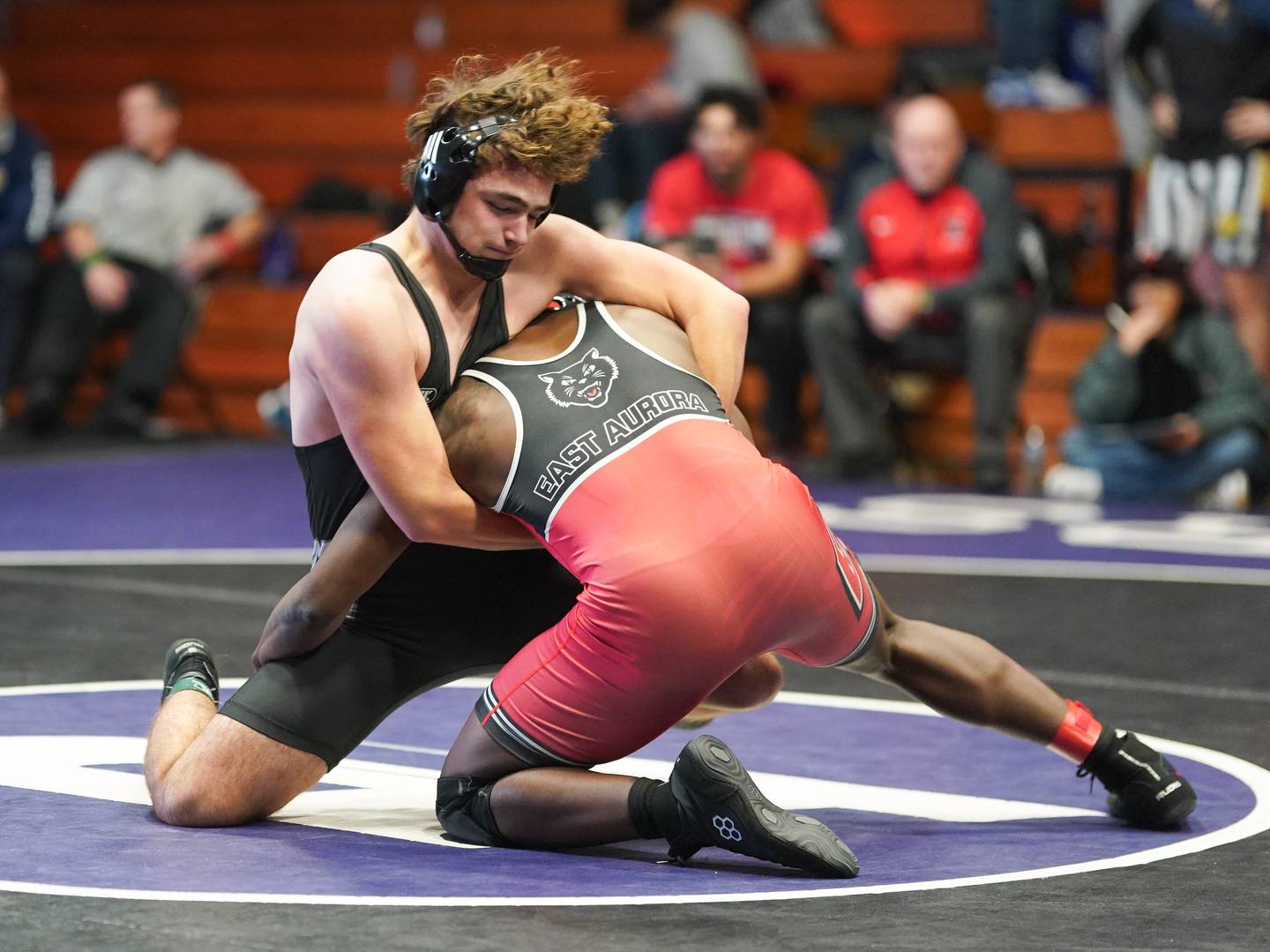 Dixon’s Will Howell (left) competes against East Aurora’s Arnold Walker in a 215 pound championship match during the Reaper Classic Wrestling meet at Plano High School on Saturday, Dec 9, 2023.