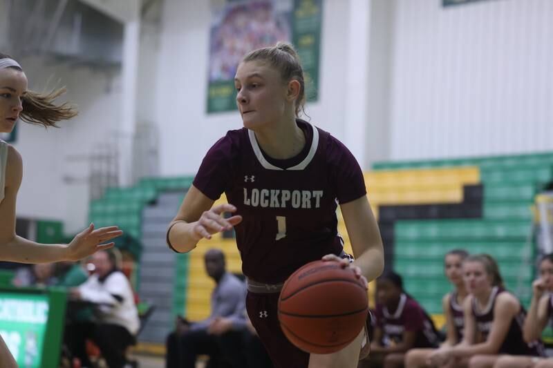 Lockport’s Patricia Tamasauskas drives to the basket against Providence.
