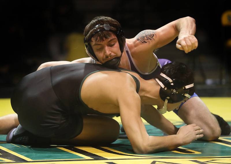 Hampshire’s Mike Brannigan controls Crystal Lake South’s Gavin Hastings during the 157-pound match of a Fox Valley Conference wrestling meet on Thursday, Jan. 15, 2026, at Crystal Lake South High School.