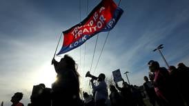 ‘Tesla Takedown’ protest drives crowd to Lisle