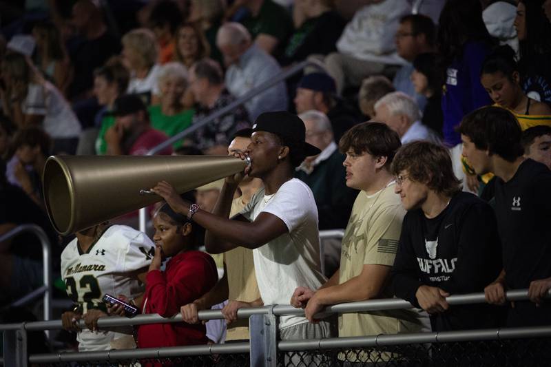 Bishop McNamara students and fans cheer on their team in a game against Chicago Christian on Friday, September 19, 2025.