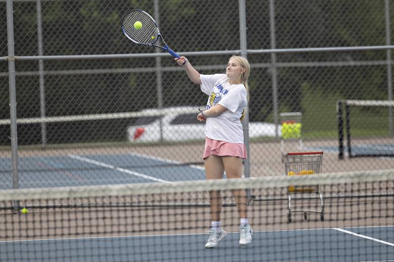 Jessica Ardis, 15, serves a ball Friday, July 25, 2025, during a family fun day at the end of the Emma Hubbs Tennis Classic in Dixon.