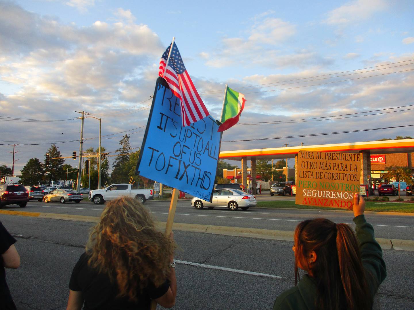 Protesters demonstrate Saturday in Joliet to show opposition to the Trump Administration's deportation actions and pending deployment of the National Guard in Chicago. Sept. 6, 2025