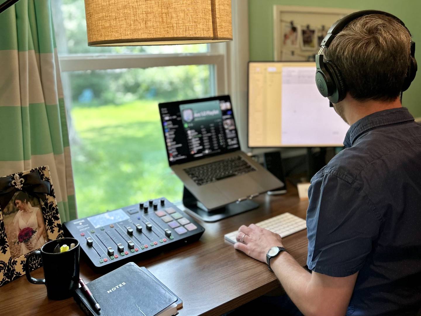 Richard Clark, owner of Area Code Audio working from his home studio in Batavia.