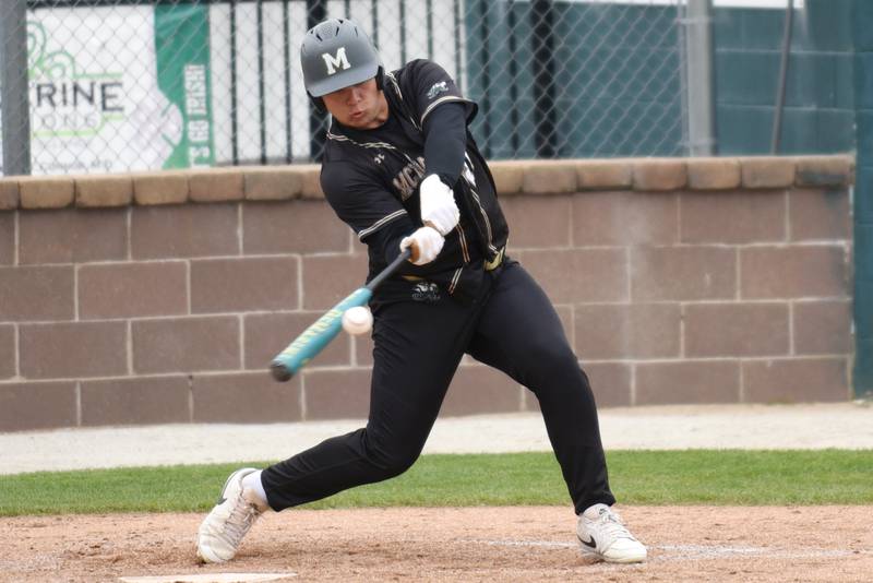 Bishop McNamara's Ian Irps hits a pitch during a home game against Hope Academy Thursday, April 30, 2026.