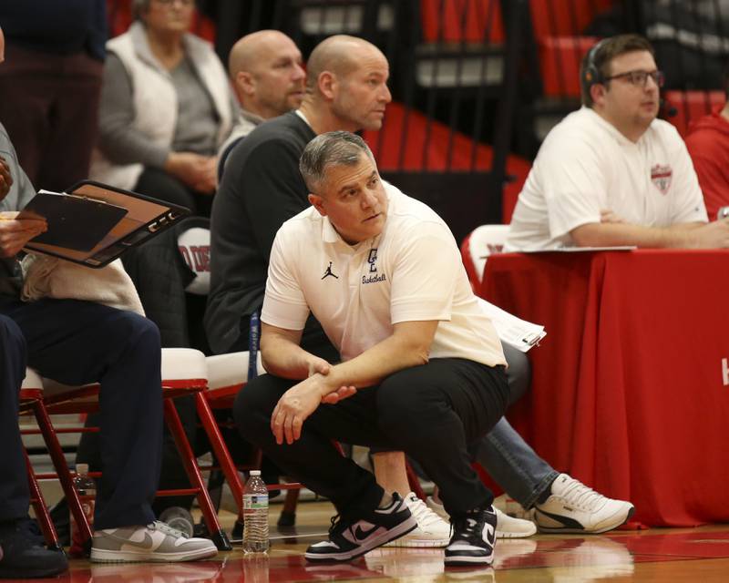 Oswego East's head coach Ryan Velasquez looks on during their Hinsdale Central Holiday Classic basketball game between Morgan Park at Oswego East Saturday, Dec 27, 2025 in Hinsdale.