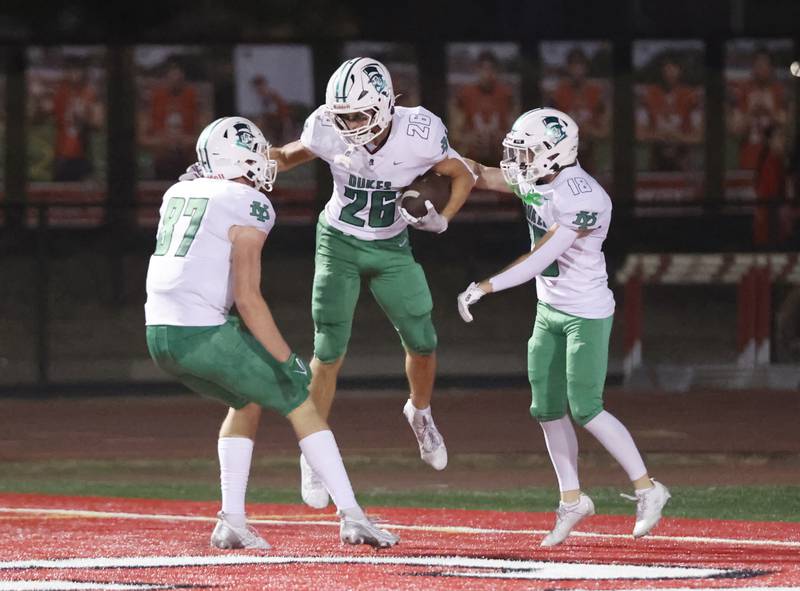 York's Henry Duda (26) celebrates a touchdown during the varsity football game between York and Hinsdale Central on Friday, Oct. 3, 2025 in Hinsdale, IL.