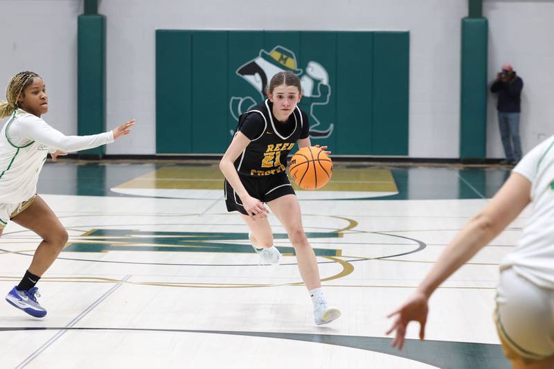 Reed-Custer's Alyssa Wollenzien drives to the basket during Bishop McNamara's 60-36 victory over Reed-Custer in the IHSA Class 2A Bishop McNamara Regional semifinals on Monday, Feb. 16, 2026.