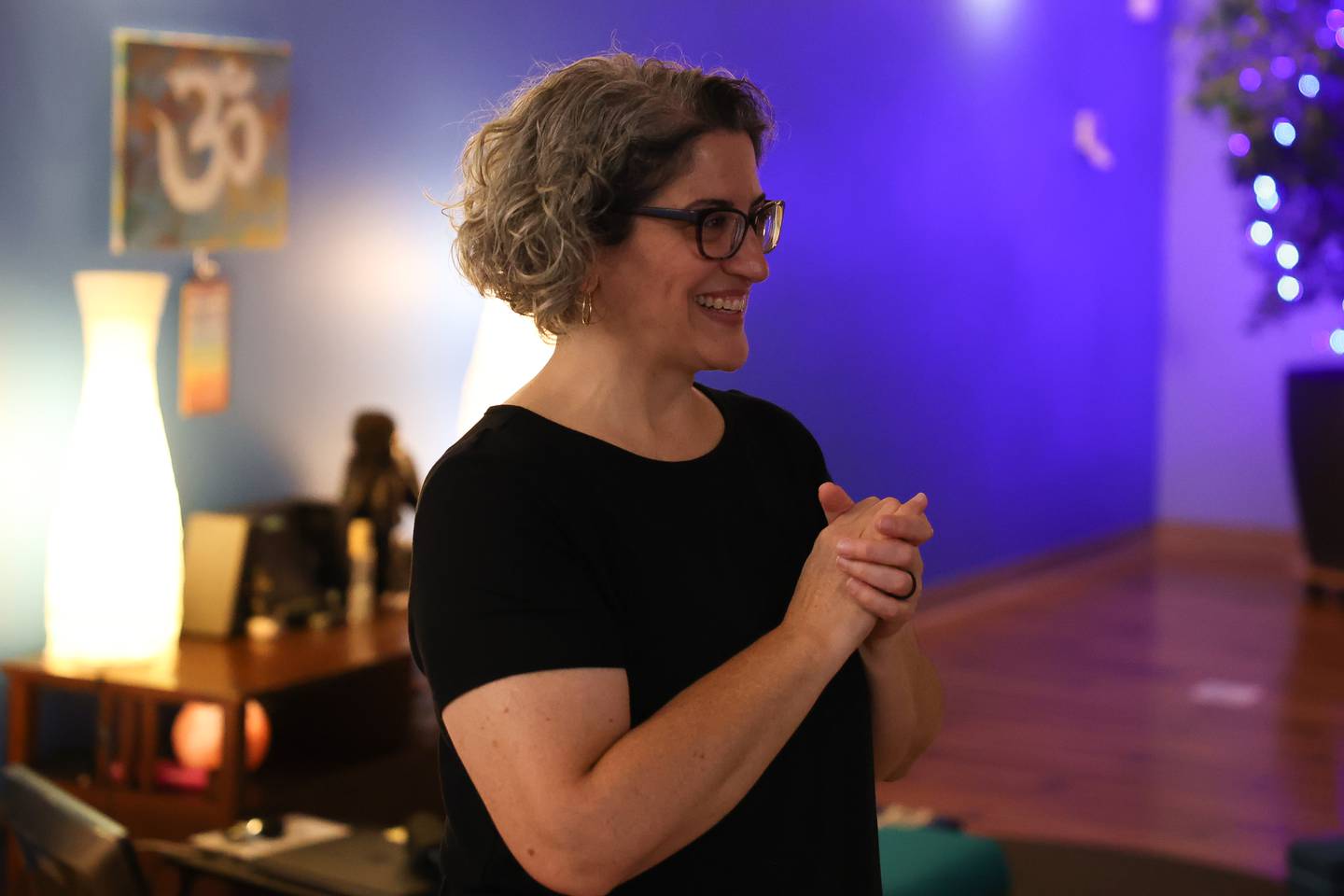 Yoga instructor Mindy Minaeri holds a monthly class for the deaf at Just Breathe Yoga Studio in Crest Hill.