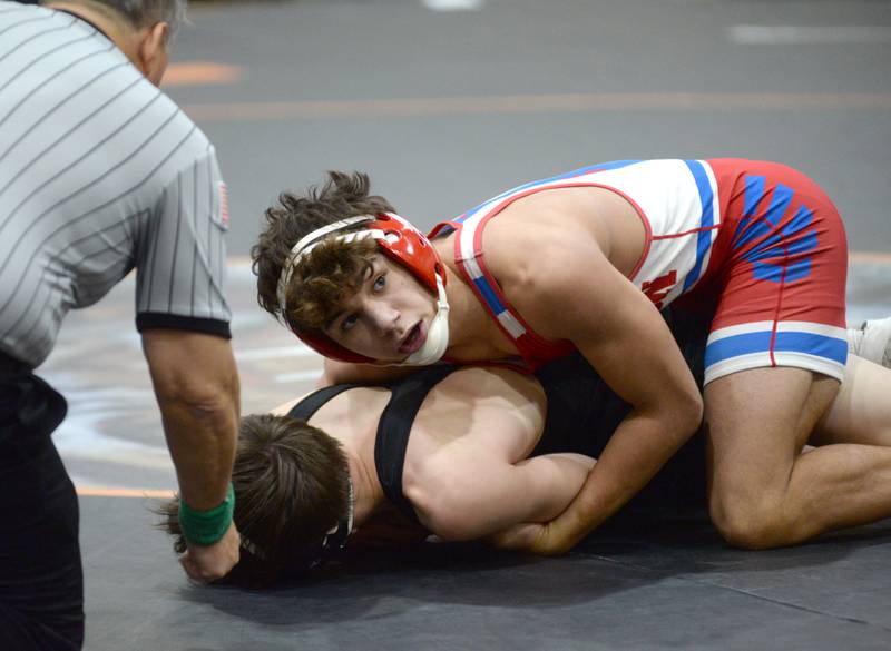 Oregon's Jayden Berry (top) looks to the scorer's table as he win his match against Byron's Cael O'Horo at 150 pounds at the 1A Byron Regional on Saturday, Feb. 8, 2025.
