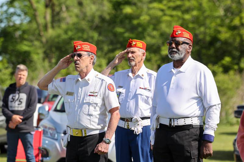 Members of the Kankakee-based Marine Corps League Detachment 1253 salute during a ceremony dedicated to the late John Kirnbauer, a veteran whose ashes went unclaimed for five years, on Monday, May 26, 2025, at Kankakee Memorial Gardens.
