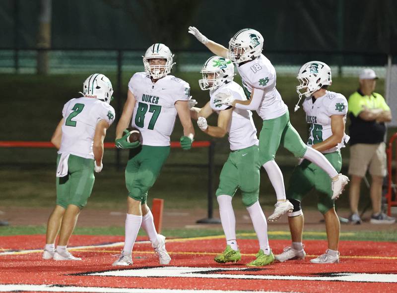York celebrates a touchdown during the varsity football game between York and Hinsdale Central on Friday, Oct. 3, 2025 in Hinsdale, IL.