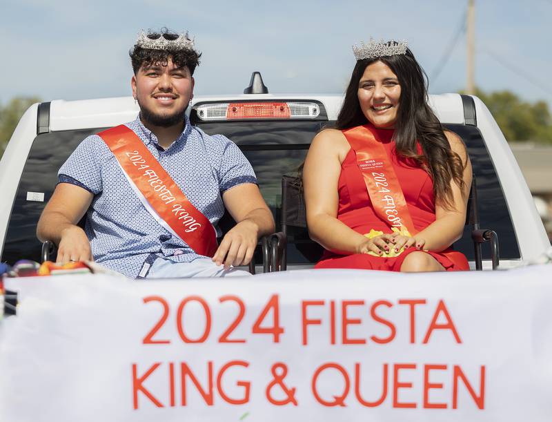 The 2024 Fiesta King and Queen Josue Arreola and Lilliana Campbell ride through the parade Saturday, Sept. 24, 2024.