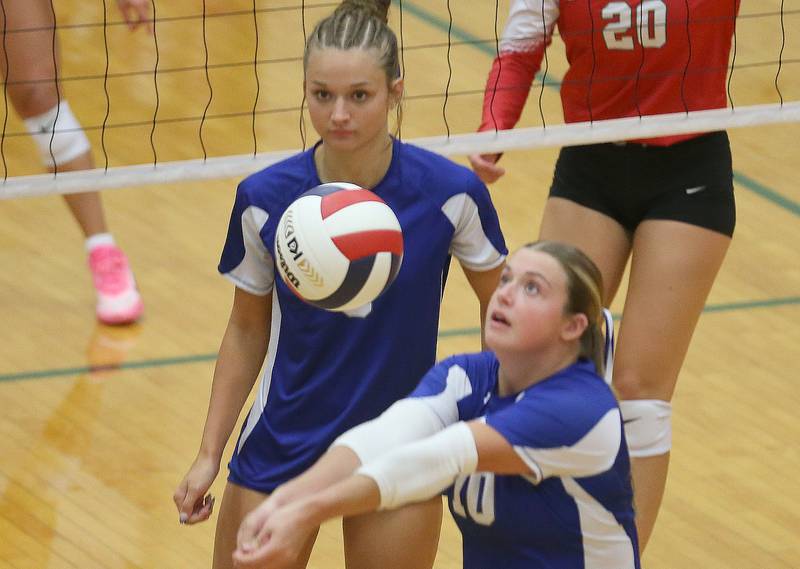 Princeton's Makayla Hecht sets the ball in the air infront of teammate Keighley Davis on Tuesday, Aug. 26, 2025 in AJ Sellett Gymnasium at L-P High School.