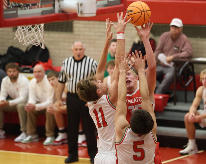 Streator's Joseph Hoekstra manages to get a shot off over L-P's Jameson Hill and teammate Erick Sotelo during the Dean Riley Shootin' The Rock Thanksgiving Tournament on Monday Nov. 24, 2025 in Kingman Gymnasium at Ottawa High School.