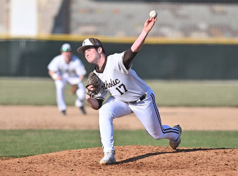 Joliet Catholic's Jake Gimbel throws a pitch during the non-conference game against Minooka on Monday, March. 11, 2024, at Joliet.